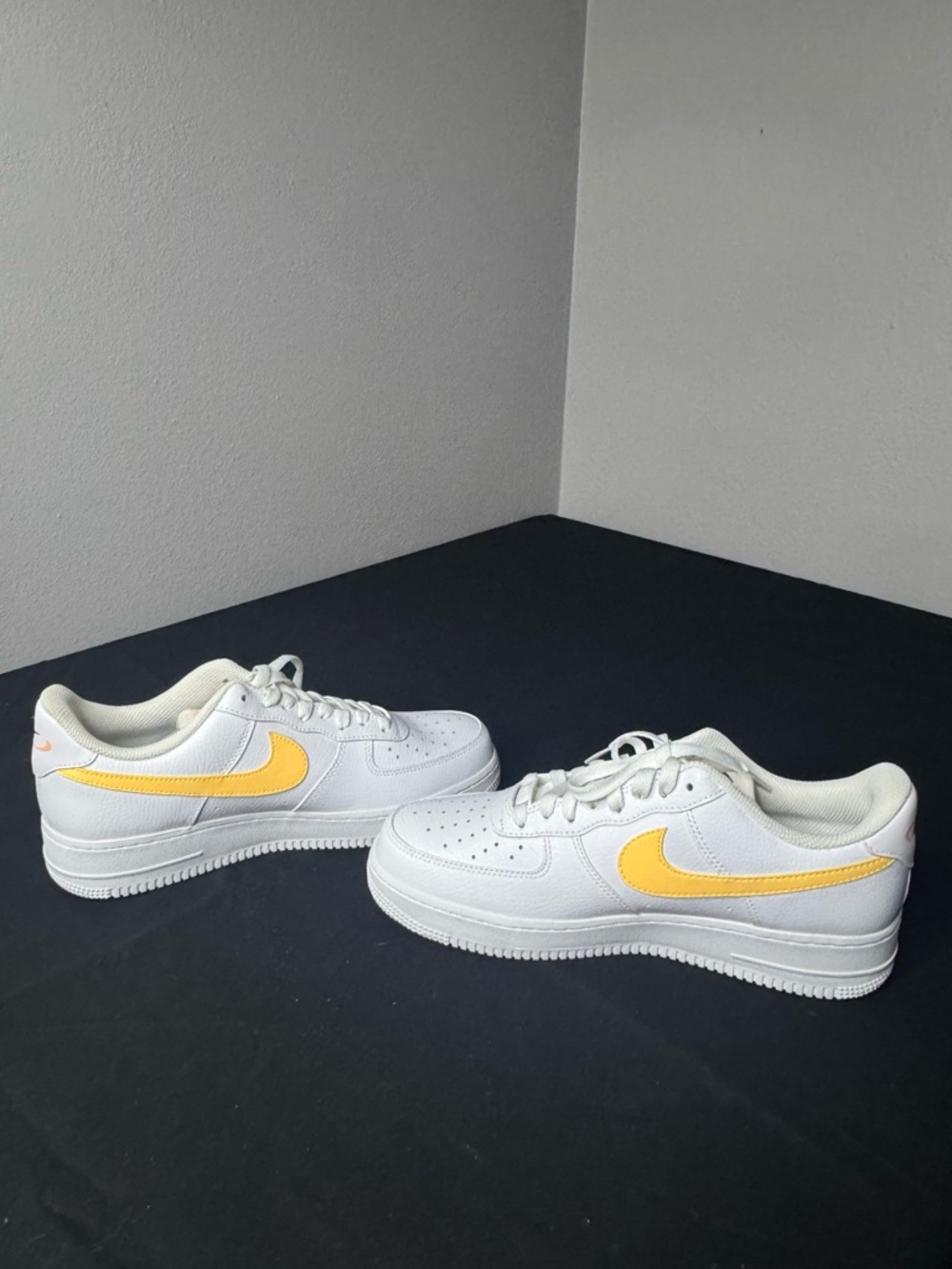 Nike White Low-Top Sneakers with Yellow Swoosh